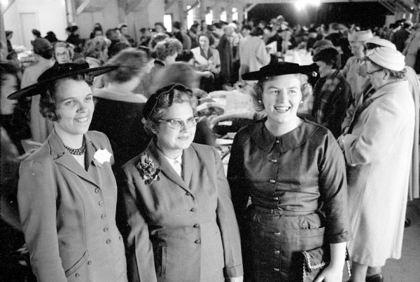 Viewing Christmas displays are (left to right): Mrs Wallace Bondhus, Mt Horeb; Mrs. Henry Wechter, Cross Plains; and Mrs. Norton Urness, Black Earth. They are members of Dane County Homemakers clubs. 