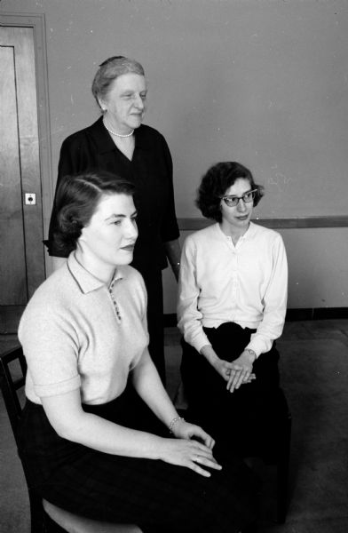 The 1958 Rosa P. Fred scholarship winner is Nancy Post (right). She is pictured with Mrs. E.B. (Rosa) Fred (upper left) and Mrs. David Kovenock (lower left), a former recipient of a University League scholarship. Each year the University League awards cash scholarships to women students on the basis of need, scholarship, and character. 