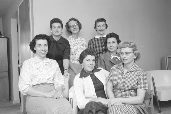 Committee chairmen for the annual card party for women residents of Westmorland. In the front row are Elizabeth Livermore, Mrs. Stanley Herbert, and Janet Eisele. In the back row are: Helen Reierson, Anne Short, Mrs. William L. Bender, and Marie Dean. The party will be in the auditorium of Our Lady Queen of Peace Catholic Church.