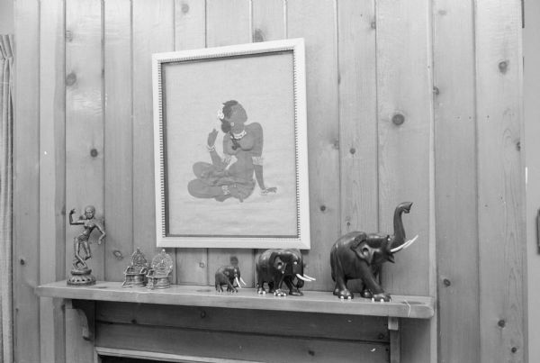 A group of Indian art objects on the mantel in the home of Agatha Fowlkes on Cambridge Road.