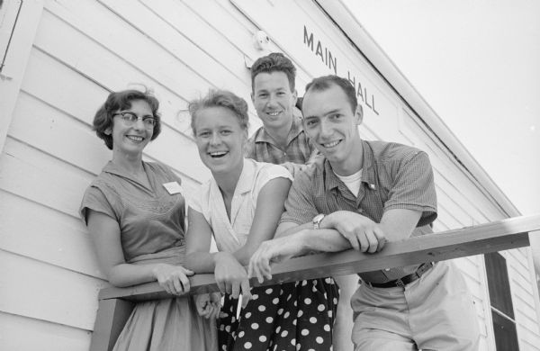 Among the 30 European and 100 American youths attending the International Religious Fellowship Conference at the Dane County fairgrounds are, left to right: Clarabell Schweppe, Madison; Toos Tiemstra, Holland; Grenville Needham, England; and Axel Hoffer, Providence, RI.  