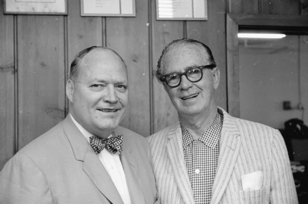 <i>Capital Times</i> sports editor Henry "Hank" Casserly with "Roundy" Coughlin.