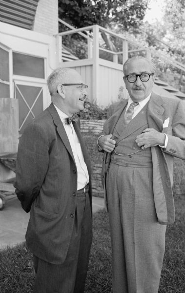 Movie and TV actor, Adolphe Menjou, right, with William Doudna, journalist for the <i>Wisconsin State Journal</i>. In 1947, Menjou was a witness in the House un-American activities investigation in Hollywood, claiming that the film capital was "wormy with Reds". In Madison, Menjou spoke about what he saw as communism's danger to the world while promoting his new television show <i>Target</i>.