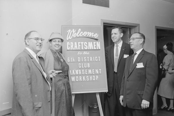 Welcomers for the club management workshop for the Printing House Craftsmen at the Blackhawk Country club. Left to right are: Mr. and Mrs. Gil LaVasser, Milwaukee; Tad Froncek, Madison; and host Earl Nelson, Madison.