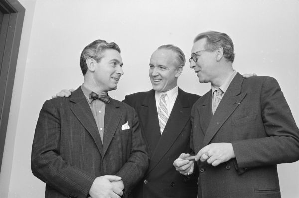 Three friends who are reunited when the Danish National orchestra from Copenhagen arrived to give two concerts in Madison are, left to right: Charles Senderovitz, orchestra concert master; pianist Gunnar Johansen, U.W. School of Music; and Waldemar Wolsing, orchestra president. Johansen will be a soloist for the orchestra concert.    
