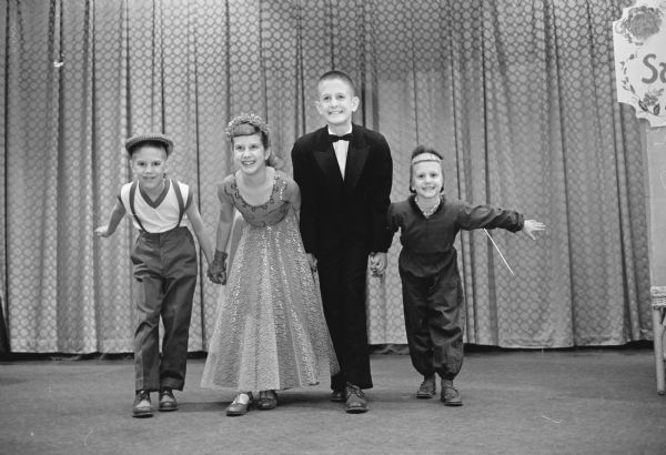 The four dancing McGilligans, Pat (7), Maureen (9), Dennis (11), and Luann (5) performing at the Vaudeville show at a meeting of the Woman's Club of Madison. They are the children of William and Marian McGilligan.