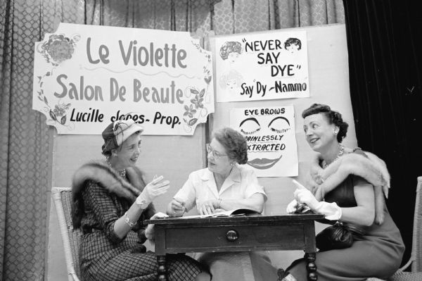 Three women perform in a comedy sketch during the vaudeville show at a meeting of the Woman's club of Madison. They are Amy Melby, Alma Beyer, and Mrs. Norman Douglass of Waunakee.