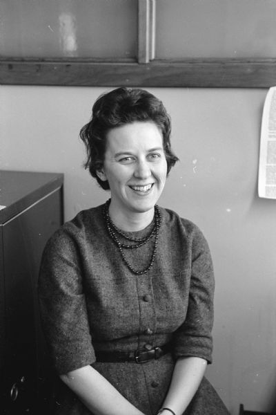 Carmen Elsner, <i>Wisconsin State Journal</i> society reporter. Portrait taken for the 10th anniversary of the newspaper moving to publishing of a morning edition.