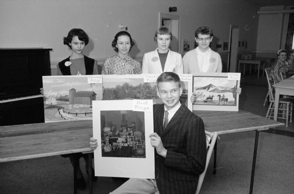 Five of the six winners in the Madison Helen Farnsworth Mears art contest. In front is the first-place winner, John Woolsey. In back, left to right, are: Mary McClain, Karen Weitendorf, Marianne Milligan, and Christa List.