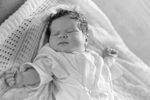 Baby Andrea Welch, age six days, is finally home asleep in her crib. Her parents are Richard and Alice Welch, 4410 Boulder Terrace.