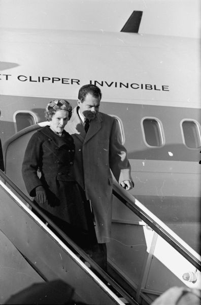 Then-Vice President Nixon leaving his airplane with his wife on a campaign stop in Madison.