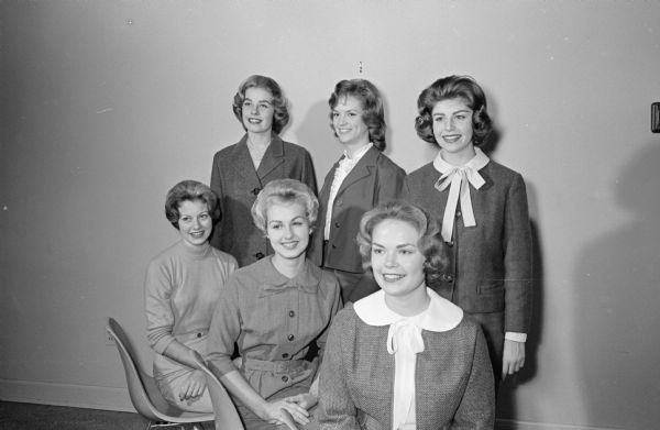Six young women are chosen from more than 250 entries to be named UW Badger Beauties for 1960-1961. Shown (front row, L-R) are Margaret Morgan (21), Delta Gamma, Kankakee, Ill; Trudy Mikell (20) Chi Omega, Chicago; and Lynnette Estes (20), Chi Omega, Scottsville, N. Y.; and (back row (L-R) are Karen Thorsen (19), Gamma Phi Beta, Westfield, N. J.; Patricia Hovey (18) Kappa Kappa Gamma, Birmingham, Mich; and Suzanne Holly (20), Gamma Phi Beta, 4041 Cherokee Drive, Madison.
Miss Thorsen was "Miss New Jersey" in the 1959 Miss America contest.