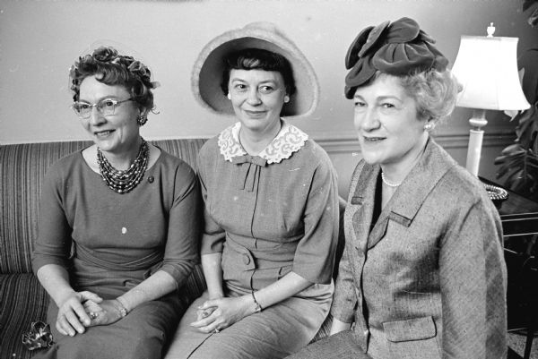 The annual meeting of the Women's Auxiliary of Madison General Hospital, 925 Mound Street, is held at the hospital. Shown, (L-R) are: Mrs. James H. Wegener, Rt. 1 Waunakee, past president; Mrs E. L. Dittner, 306 N. Franklin Avenue, elected first vice-president; and Mrs. Walter Greenberg, 1315 Farwell Drive, elected president.