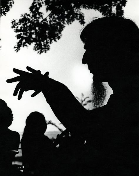 Silhouette of Michel France, math professor, outdoors at Memorial Union.