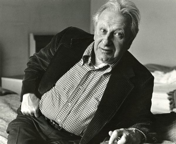 Louis "Studs" Terkel sitting in his hotel room.