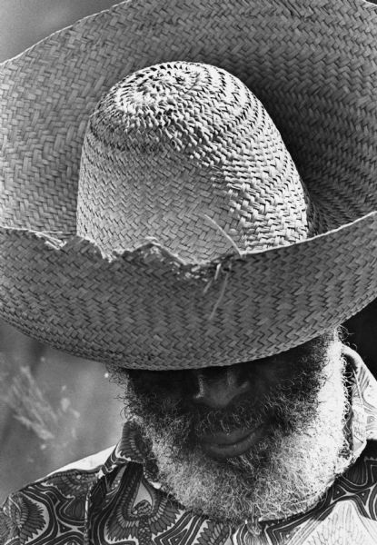 Artist Simon Sparrow wearing a large hat.
