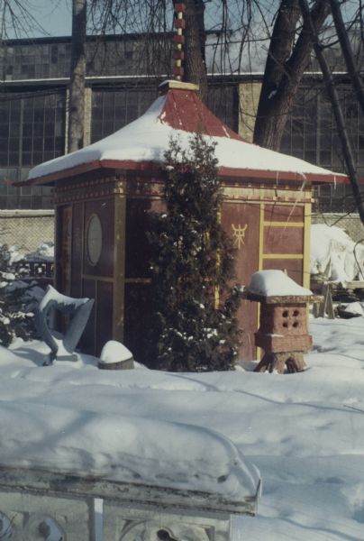 Japanese Tea Pavilion with an Oriental Ground Lantern and "Closed Abstraction in White" in Sid's backyard. Madison-Kipp Corporation is in the background.