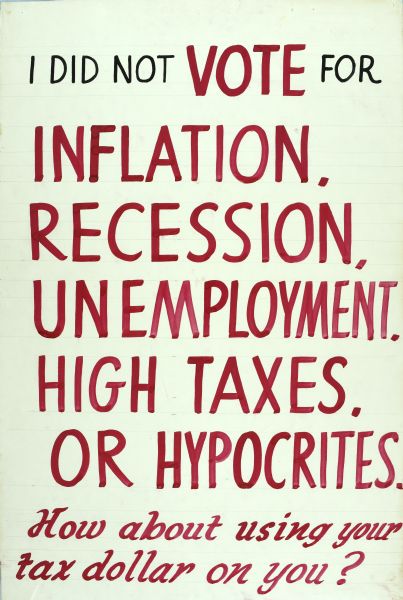 A political poster with text reads: "I Did Not Vote For Inflation, Recession, Unemployment, High Taxes Or Hypocrites. How about Using Your Tax Dollar On You?"
