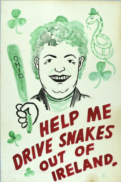 A woman with green hair is holding a green stick with the text "Ohio" on it. Drawn in green is a snake at top right, wearing a hat, and clover leaves. On the bottom the text, in red letters reads: "Help Me Drive Snakes Out Of Ireland."