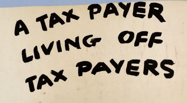 Black letters on white, text reads: "A Tax Payer Living Off Tax Payers."
