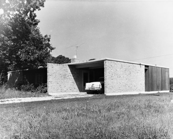 Arthur Boseler House, Keck and Keck Project #507. Project date 1954. George Fred and William Keck were born in Watertown, Wisconsin, and operated an architectural office on Michigan Avenue in Chicago, Illinois. This photograph shows the carport and front of the Boseler house in Olympia Fields, Illinois.