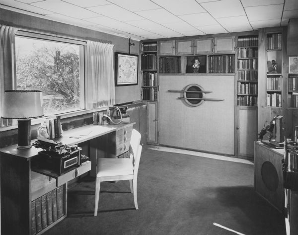 The Maurice and Violet Brasseur House was designed by the architectural firm Keck and Keck as Project #267 in 1941. This room contains a large, built in radio. Mr. Brasseur was an electrical engineer. 