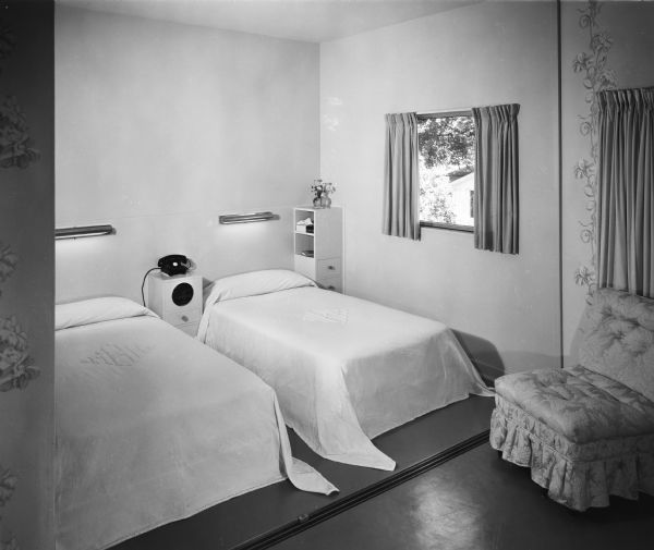 The William and Majel Kellett House was designed by the architectural firm Keck and Keck as Project #243 in 1940. This is a photograph of a bedroom in the Kellett house in Menasha, Wisconsin. William Kellett spent his entire professional life at Kimberly Clark Corporation, becoming it's President and eventually retiring in 1964.