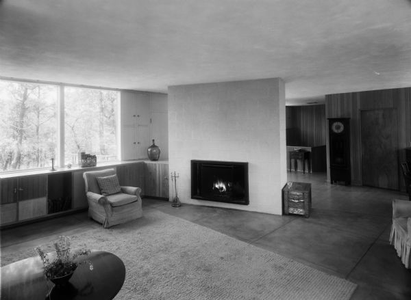 The Avery O. Craven House was designed by the architectural firm Keck and Keck as Project #407 in 1949. This photograph shows the living room of the Craven House in Dune Acres, Indiana, including the fireplace. Avery O. Craven was a nationally known Civil War historian. 