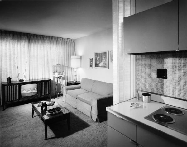 Cook County Housing Authority Elderly Housing, Keck and Keck project #795. Project date 1969. This is a photograph of the living room and kitchen in the housing project built in Skokie, Illinois.