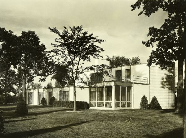 Herbert Brunig House, Keck and Keck Project #195. Project date 1935. This is a photograph of the back of the Brunig house. Herbert, of the Charles Brunig Co., and his family of five lived in this 15 room home on Blackhawk Road in Indian Hills Estates, Wilmette, Illinois. Keck designed 26 homes in Indian Hills, but it was only the last in the development, the Brunig house, that was designed in the International Style. 