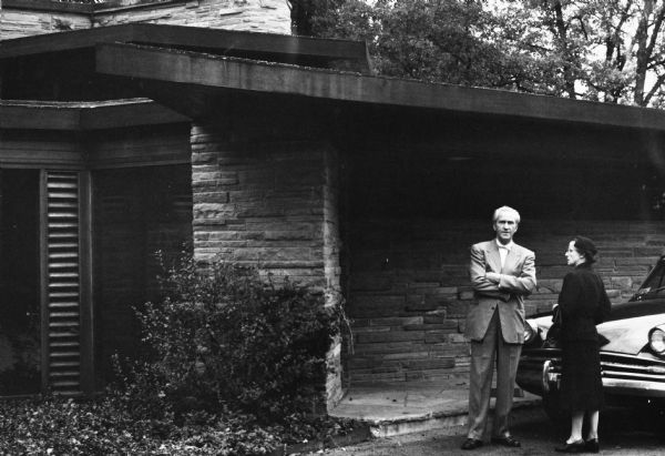 The Abel and Mildred Fagen House was designed by the architectural firm Keck and Keck as Project #387 in 1948. This is a photograph of George Fred and Lucile Keck at the entry to the Fagen house in Lake Forest, Illinois.
