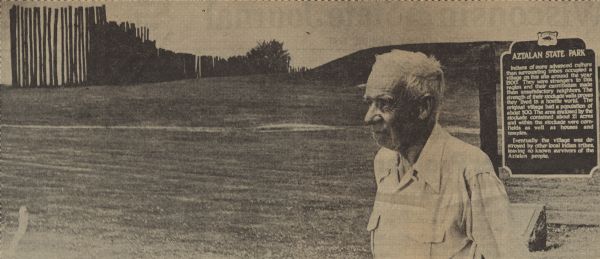 Albert Kratch, president of the Lake Mills-Aztalan Historical Society, in front of the Aztalan State Park historical marker. Kratch helped to organize events such as a picnic to celebrate the Society's 25th anniversary and to bring awareness to the preservation of Aztalan as an historic site. 