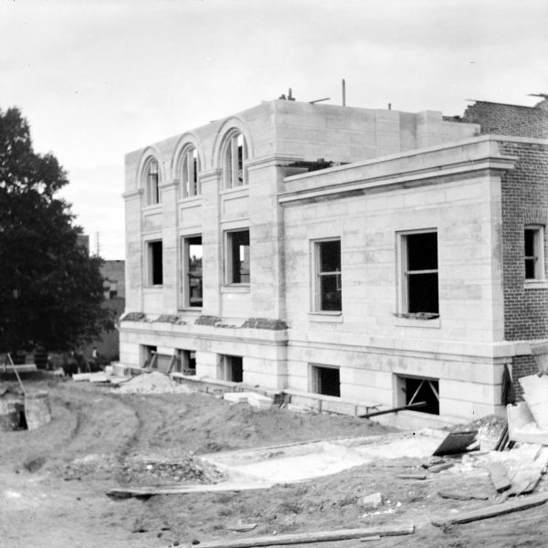 Elevated view of the partially completed Eau Claire Public Library during its construction at Farwell Street and Grand Avenue.