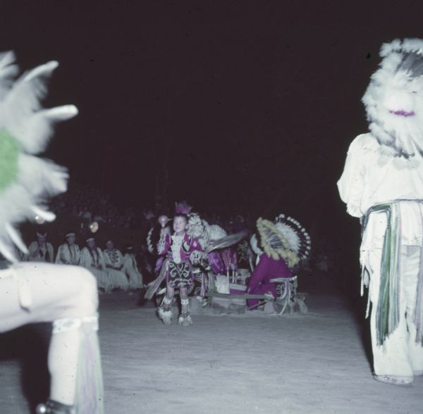 A Native American Indian child is performing a ceremonial dance at the Stand Rock Indian Ceremonial.