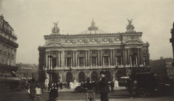 View across plaza towards the Opera. Caption reads: "The Opera, the most famous of all national theaters, Paris."