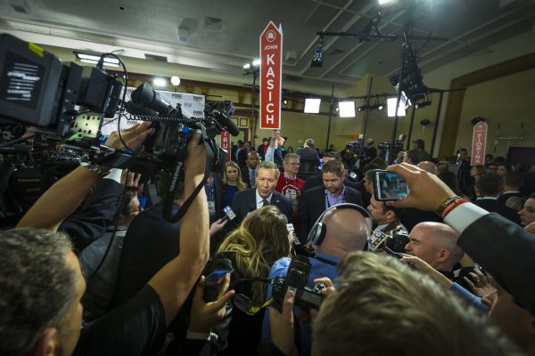 The Governor of Ohio, John Kasich, talking to the press in the spin room of the Republican presidential debates.