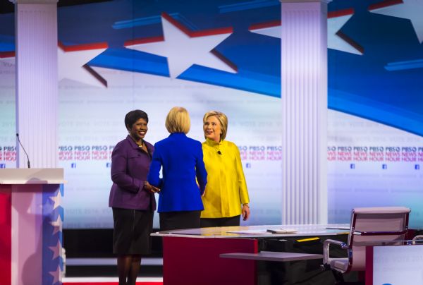 Hillary Clinton greeting Gwen Ifill and Judy Woodruff, two anchors of the PBS NewsHour and the moderators for the Democratic presidential debate, held in the Helen Bader Concert Hall.