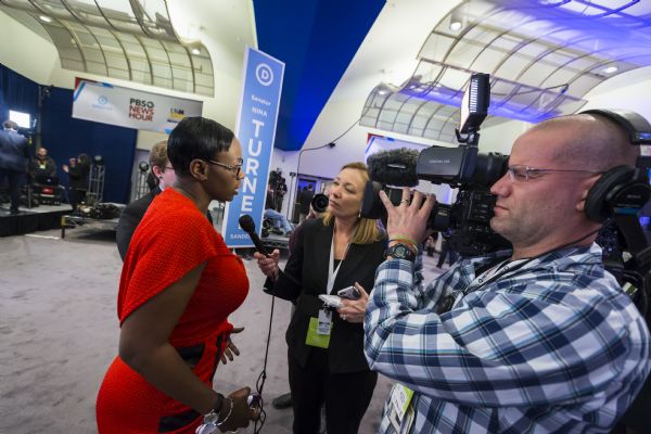 Former Ohio State Senator Nina Turner, a spokesperson for Democratic Presidential candidate Bernie Sanders, talking with Wisconsin Public Television reporter Frederica Freyberg in the spin room after the Democratic presidential debate.