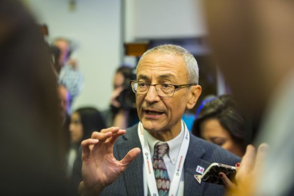 John Podesta, Hillary Clinton's campaign chairman, talking to reporters in the spin room after the Democratic presidential debate.