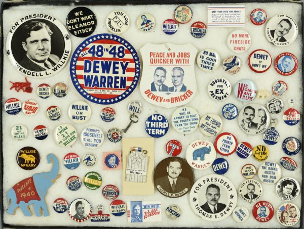 Framed assortment of buttons in support of Wendell Willkie (1940), Thomas Dewey and running mate John Bricker (1944), and Thomas Dewey and running mate Earl Warren (1948). Most are typical round buttons featuring the candidates names or portraits. Several buttons are specifically anti-Franklin Roosevelt, such as one reading: "We don't want Eleanor either," "He will be harder to beat the fourth time than the third, do your duty now," and "Roosevelt for Ex President."