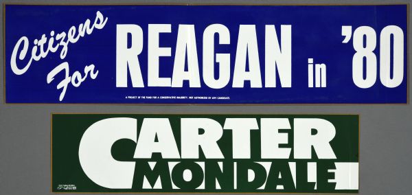 Two bumper stickers. The top bumper sticker, which has white type on a blue background, reads: "Citizens For Reagan in '80." The bottom bumper sticker, which has white and green type on a green and white background, reads: "Carter Mondale."