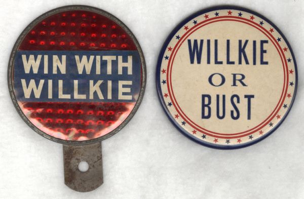 Reflector and button for Wendell Willkie's political campaign. The metal reflector on the left is red, and has a "Win with Willkie" sign with white text on a blue background. On the right is a button that has blue text on a white background with a border of red and blue stars and stripes and reads: "Willkie or Bust."