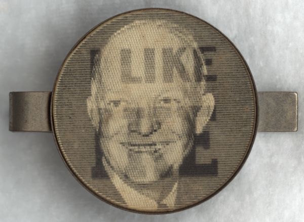 Lenticular tie pin. One view has a head and shoulders portrait of Dwight D. Eisenhower, and the other view reads: "I Like Ike."