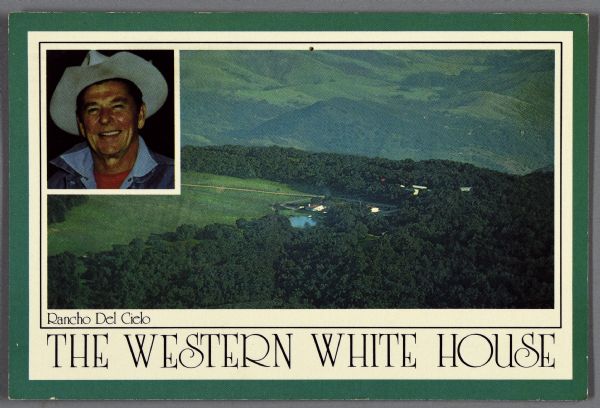 A presidential political campaign postcard with an aerial view of Rancho Del Cielo, or "The Western White House." In the upper left corner is a head and shoulders portrait of Ronald Reagan wearing a cowboy hat.