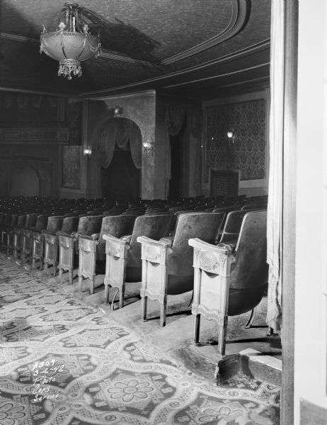 Interior view of Orpheum Theatre aisle 2, looking towards the seats.