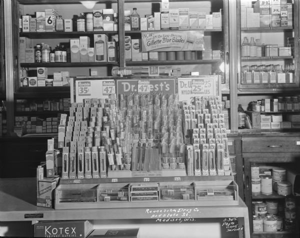 Counter display of Dr. West's Miracle Tuft toothbrushes at Rennebohm's store at 204 State Street.