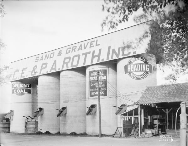 Five coal silos at C.E. and P.A. Roth Inc., sand and gravel company, at 1208 Roth Street.