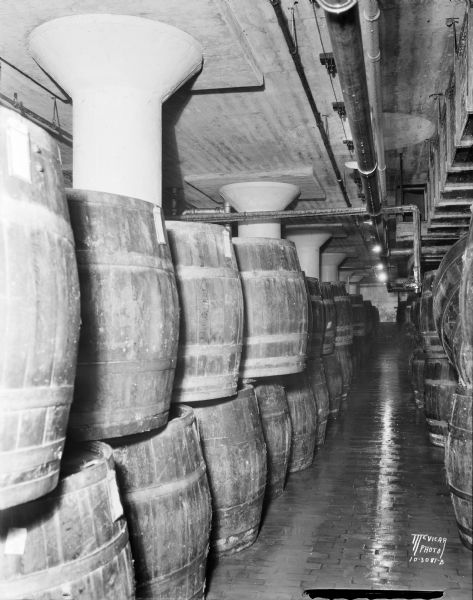 Barrels of pickles stacked in a room at Oscar Mayer.