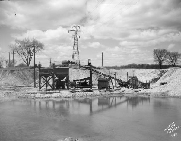 View from the east towards the Carl E. & Paul G. Roth gravel pit, showing conveying equipment.