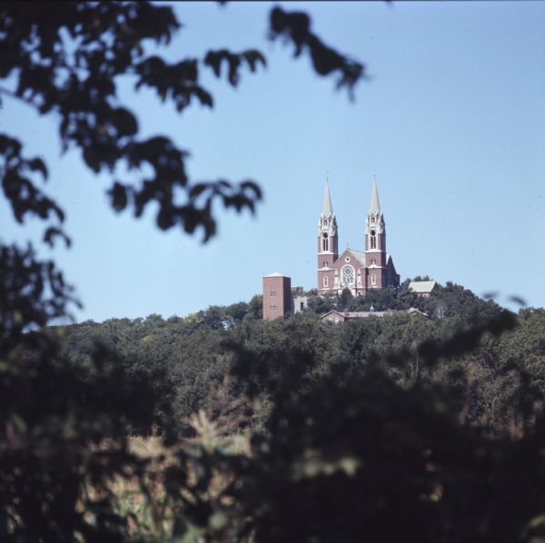 View through the trees towards Holy Hill in the distance.